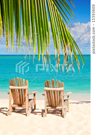 Two beach chairs on tropical shore Two beach chairs on tropical shore 15393609