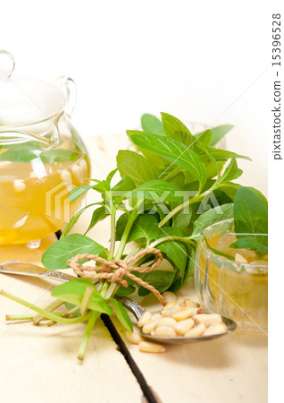 Arab traditional mint and pine nuts tea Arab traditional mint and pine nuts tea 15396528
