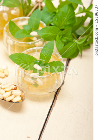 Arab traditional mint and pine nuts tea Arab traditional mint and pine nuts tea 15396537