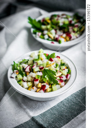 Vegetable salad on wooden background Vegetable salad on wooden background 15396572