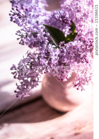Bouquet of lilacs on wooden background 15396615