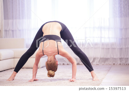 Woman doing sport exercises at home Woman doing sport exercises at home 15397513