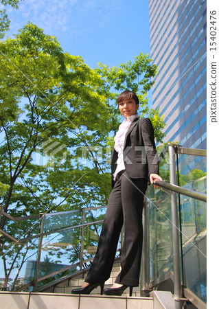 Woman standing on the stairs 15402476