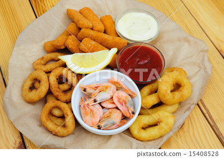 beer snack, shrimps, calmar rings and fish sticks 15408528