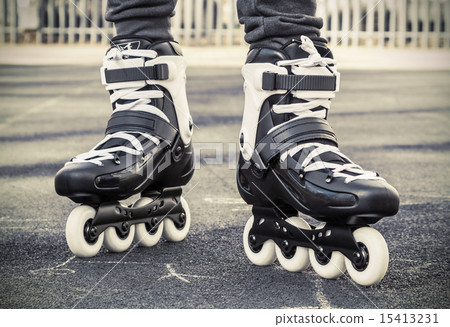 walk on roller skates for skating. toned photo walk on roller skates for skating. toned photo 15413231