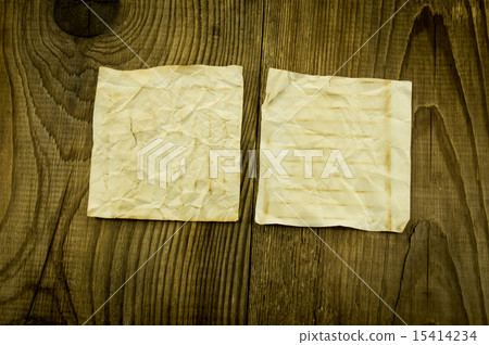 old paper on wood background old paper on wood background 15414234
