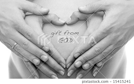 mom with hand on the baby by heart shape symbol 15415241