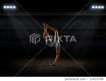Girl engaged art gymnastic at sports hall 15419798