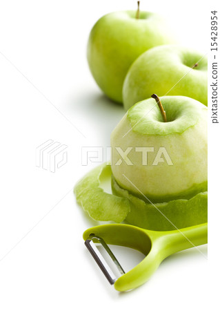 peeled green apple with peeler 15428954