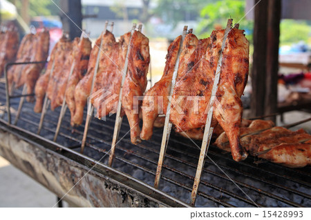 Roast chicken on grill stove on sale 15428993