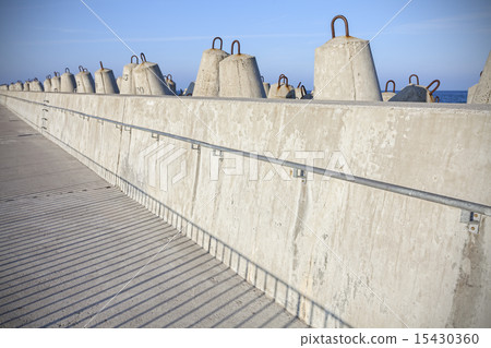 Sea pier and concrete block breakwaters. Sea pier and concrete block breakwaters. 15430360
