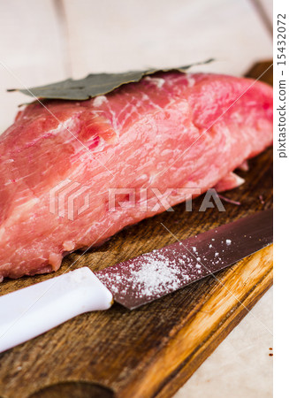 raw meat on a cutting board on a white background raw meat on a cutting board on a white background 15432072