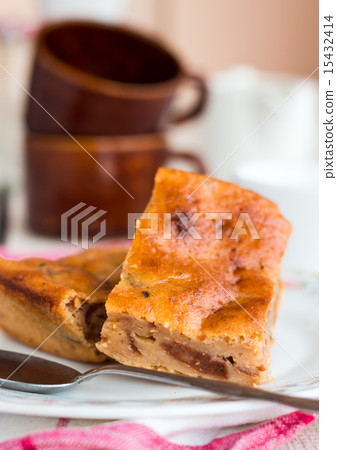 flavored pudding cake with apricot jam 15432414