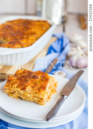 piece of meat lasagna with mushrooms on a plate piece of meat lasagna with mushrooms on a plate 15432568