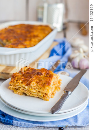 piece of meat lasagna with mushrooms on a plate piece of meat lasagna with mushrooms on a plate 15432569