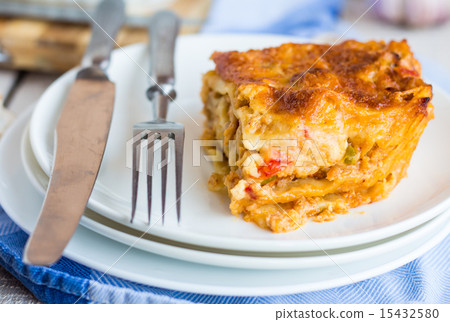 piece of meat lasagna with mushrooms on a plate piece of meat lasagna with mushrooms on a plate 15432580