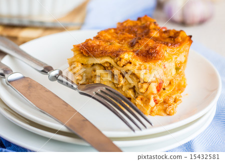 piece of meat lasagna with mushrooms on a plate piece of meat lasagna with mushrooms on a plate 15432581