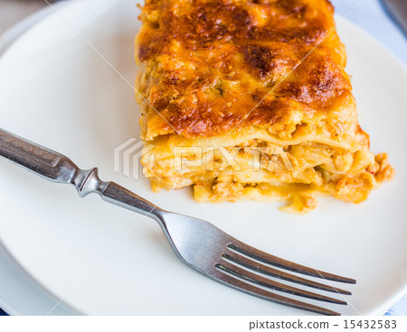 piece of meat lasagna with mushrooms on a plate piece of meat lasagna with mushrooms on a plate 15432583