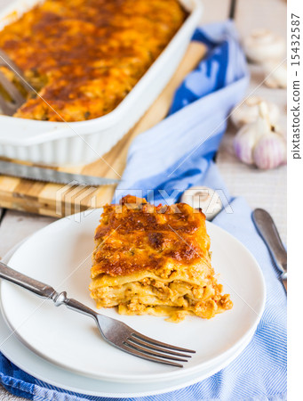 piece of meat lasagna with mushrooms on a plate piece of meat lasagna with mushrooms on a plate 15432587