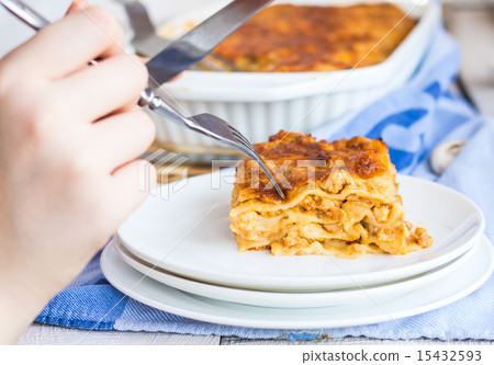 piece of meat lasagna with mushrooms on a plate piece of meat lasagna with mushrooms on a plate 15432593