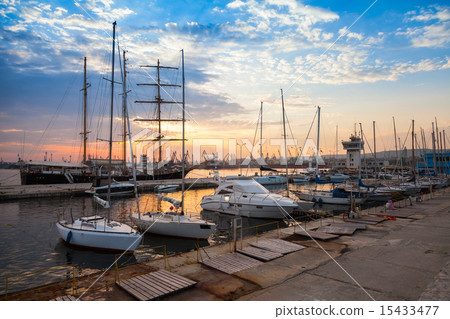 Sailing ships and yachts stand moored in Varna 15433477
