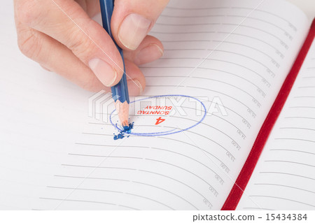 female hand breaks a lead pencil 15434384