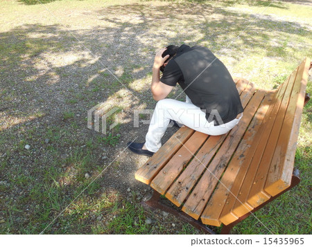 Man holding his head Man holding his head 15435965