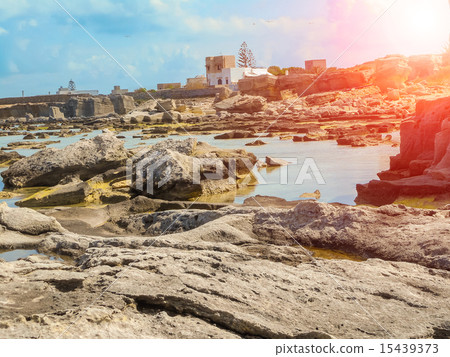 A view of a rocky shore of a Sicily island A view of a rocky shore of a Sicily island 15439373