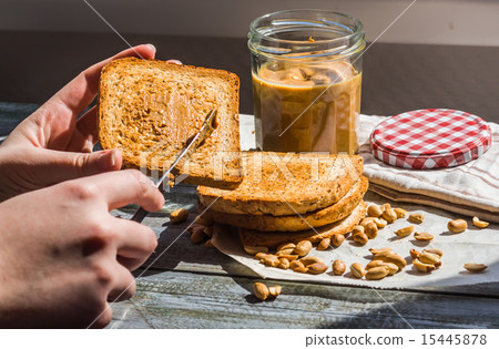 add to ruddy toast peanut butter, hand, breakfast 15445878