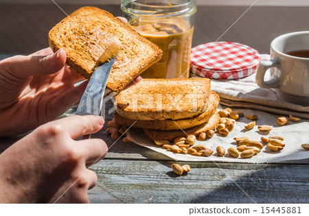 add to ruddy toast peanut butter, hand,breakfast 15445881
