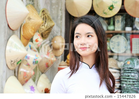Ao zai beautiful woman in a souvenir shop in Vietnam Ao zai beautiful woman in a souvenir shop in Vietnam 15447826