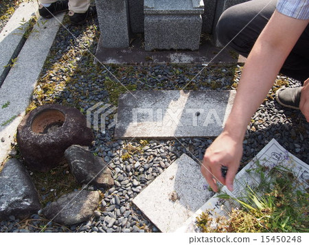 A visit to a grave 15450248