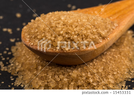 Brown sugar in spoon Brown sugar in spoon 15453331