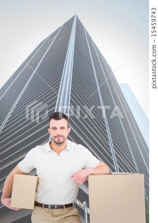 Composite image of delivery man with trolley of boxes Composite image of delivery man with trolley of boxes 15459743