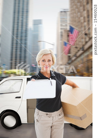 Composite image of happy delivery woman looking for signature Composite image of happy delivery woman looking for signature 15460028