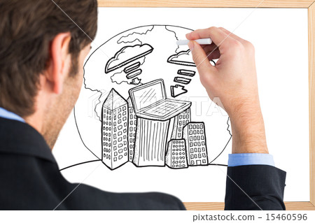 Composite image of businessman writing with a white chalk 15460596
