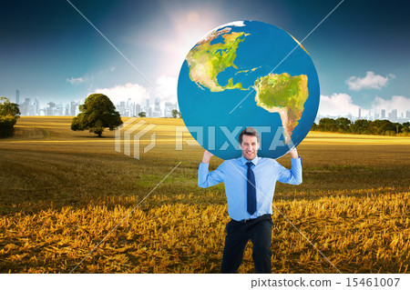 Composite image of businessman carrying the world 15461007