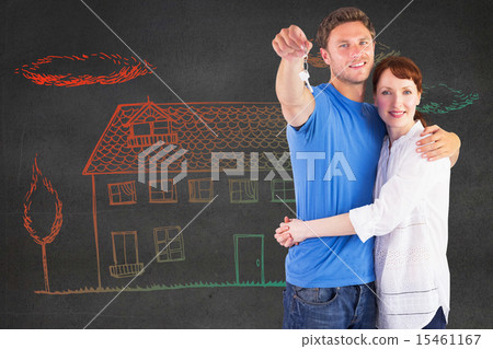 Composite image of couple holding keys to home Composite image of couple holding keys to home 15461167