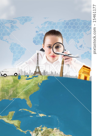 Composite image of businesswoman typing and looking through magn 15461177