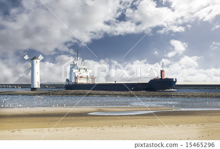 Cargo ship entering port. 15465296