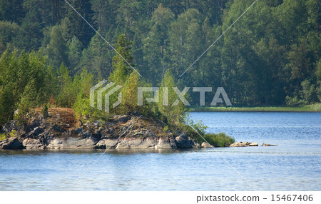 Ladoga lake with island under sunlight 15467406