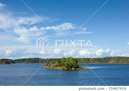 Ladoga lake with small island under sunlight 15467414