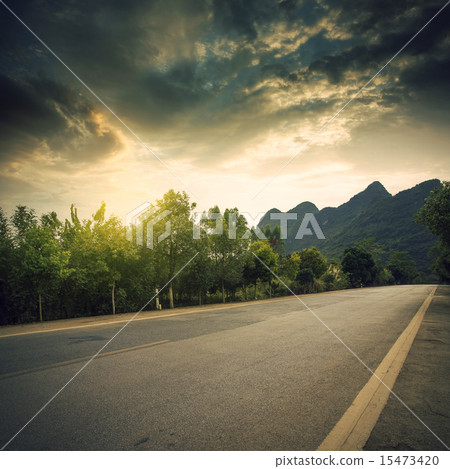 Road and mountain background 15473420