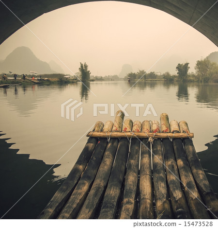 China Guilin Yangshuo bamboo rafting in the beautiful "Yulong River" 15473528