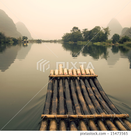 China Guilin Yangshuo bamboo rafting in the beautiful "Yulong River" 15473565