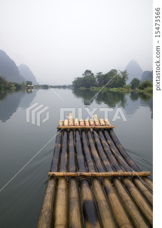 China Guilin Yangshuo bamboo rafting in the beautiful "Yulong River" 15473566