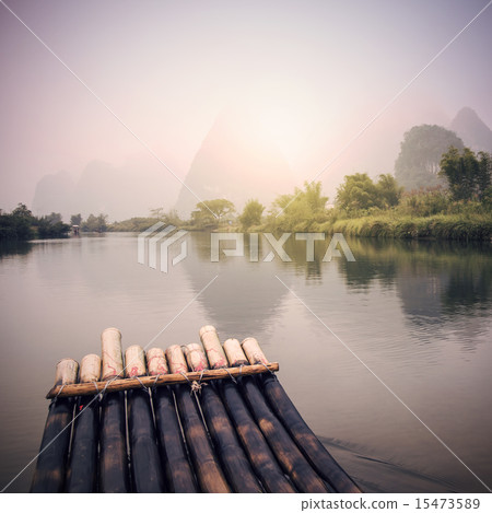 China Guilin Yangshuo bamboo rafting in the beautiful "Yulong River" China Guilin Yangshuo bamboo rafting in the beautiful "Yulong River" 15473589