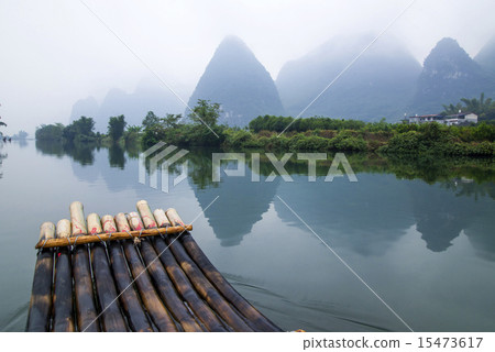 China Guilin Yangshuo bamboo rafting in the beautiful "Yulong River" China Guilin Yangshuo bamboo rafting in the beautiful "Yulong River" 15473617