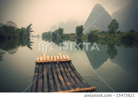 China Guilin Yangshuo bamboo rafting in the beautiful "Yulong River" 15473621