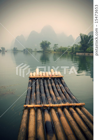 China Guilin Yangshuo bamboo rafting in the beautiful "Yulong River" China Guilin Yangshuo bamboo rafting in the beautiful "Yulong River" 15473653